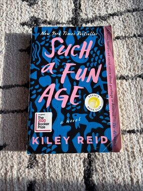 "Such a Fun Age" - Blue & Pink Paperback Novel